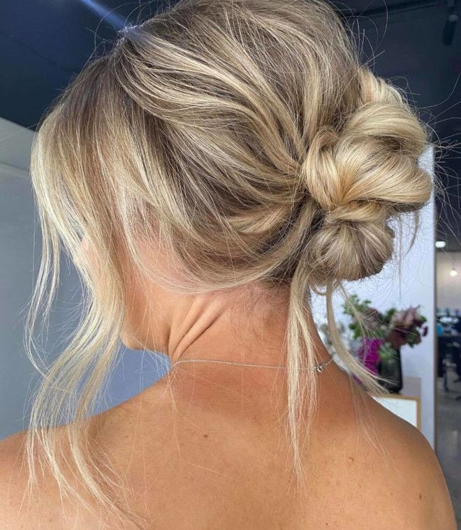 Messy Bun with Face-Framing Layers